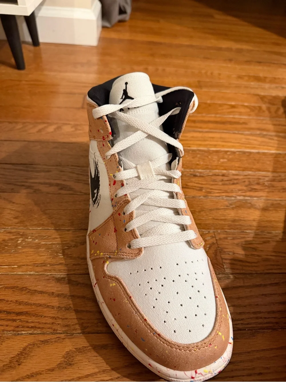 Jordan 1 Mid SE sneakers in sail/black-cider red.
